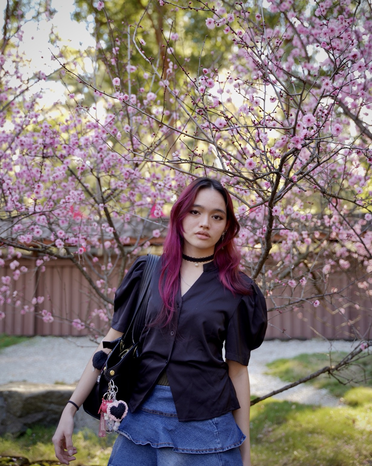 Environmental portrait beneath flowering branches